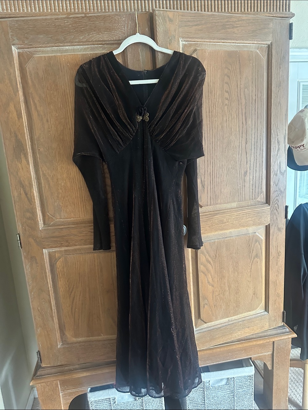 Black Long-Sleeve Evening Dress with Subtle Metallic Accents